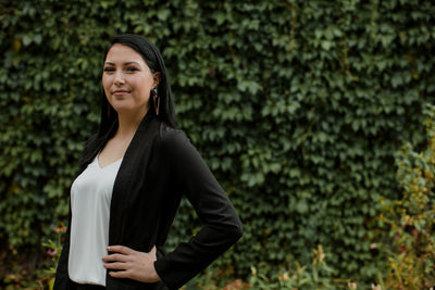 business-woman-with-hand-on-hip - Simthread - High Quality Machine Embroidery Thread Supplier